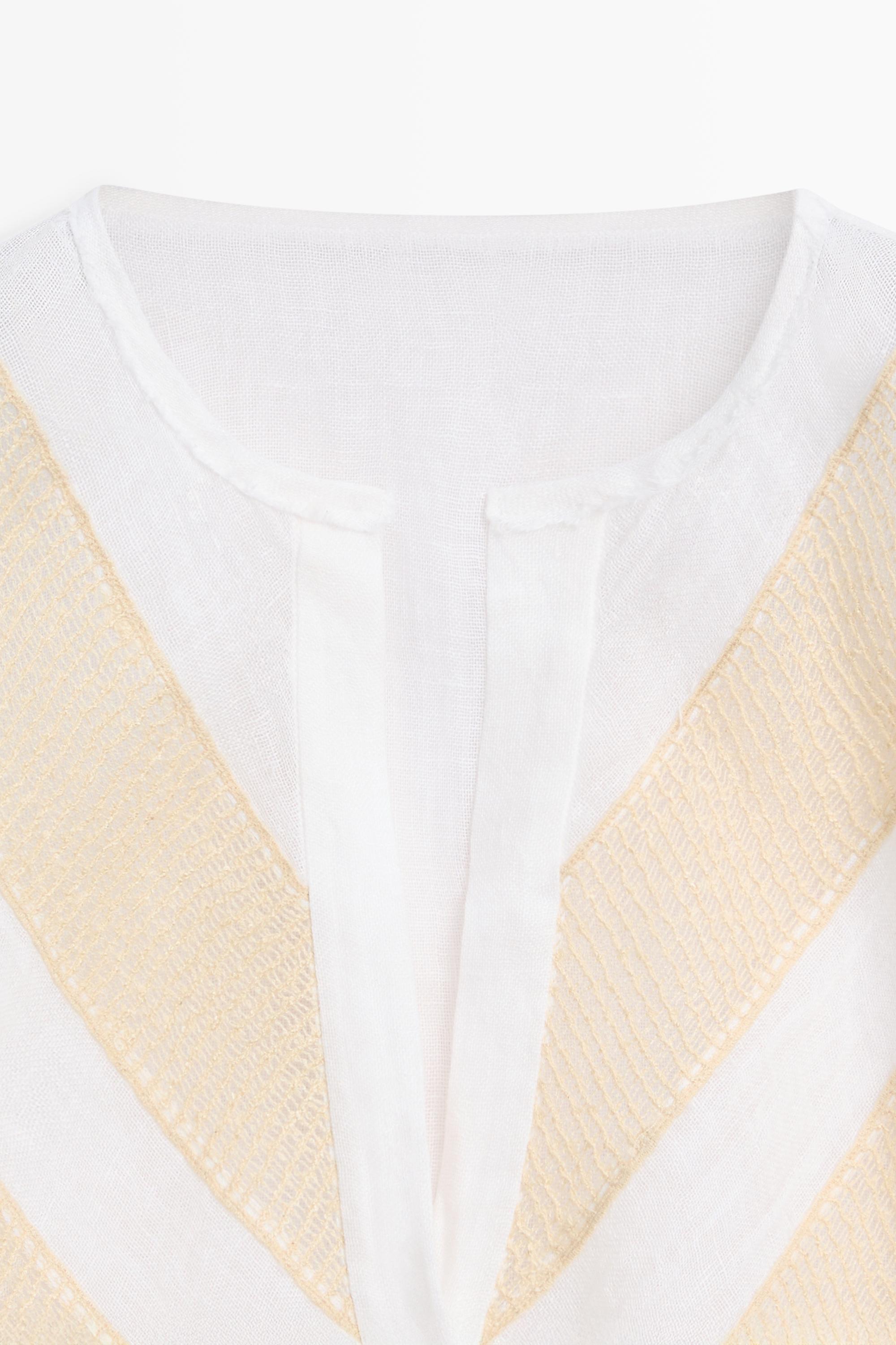 Flowing linen blend shirt with appliqué detail